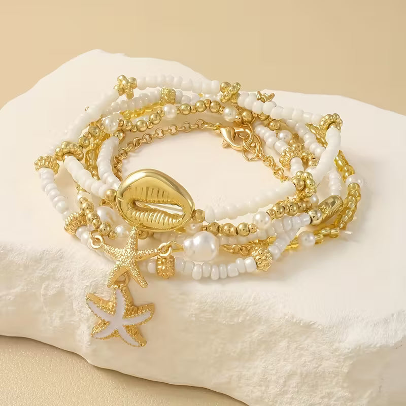 CORALIA | COASTAL GOLD & PEARL BRACELET SET OF 6